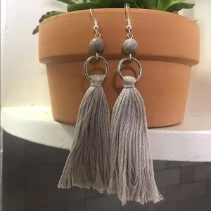 Light gray with light peach accent tassel earrings